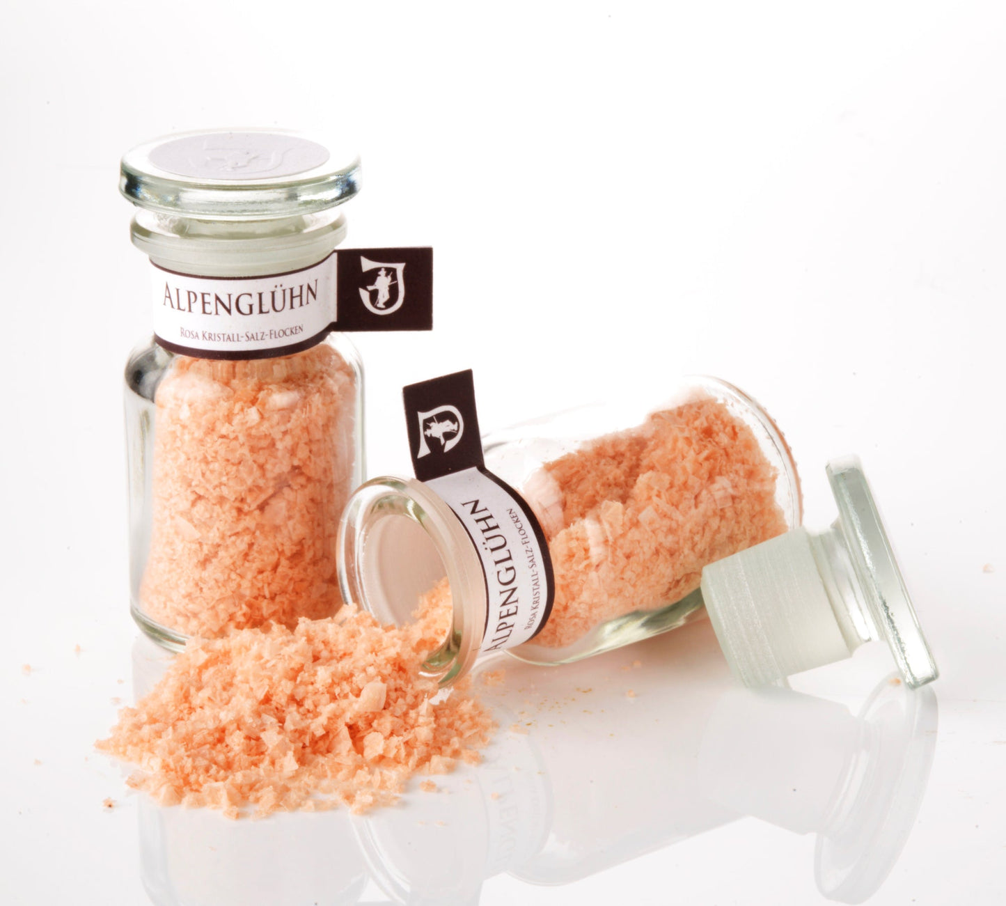Jennerwein Salz Alpenglühn | in hochwertigem Apothekerglas - 30 g -  Rosa - Kristallsalz - Flocken - Jennerwein